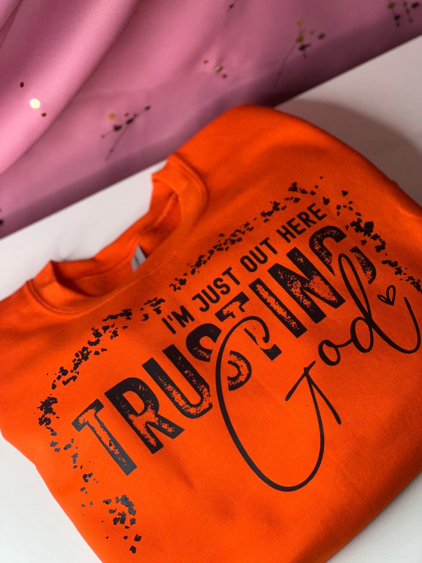 I'M JUST OUT HERE TRUSTING GOD T-SHIRT